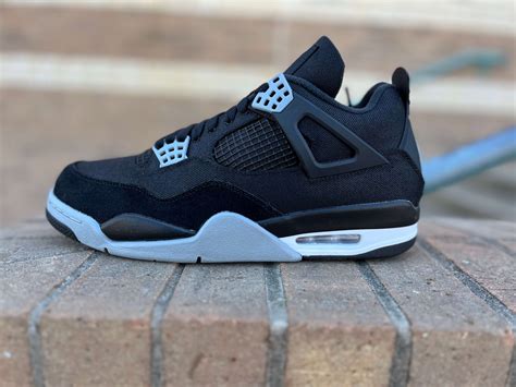 black canvas jordan 4 retro.